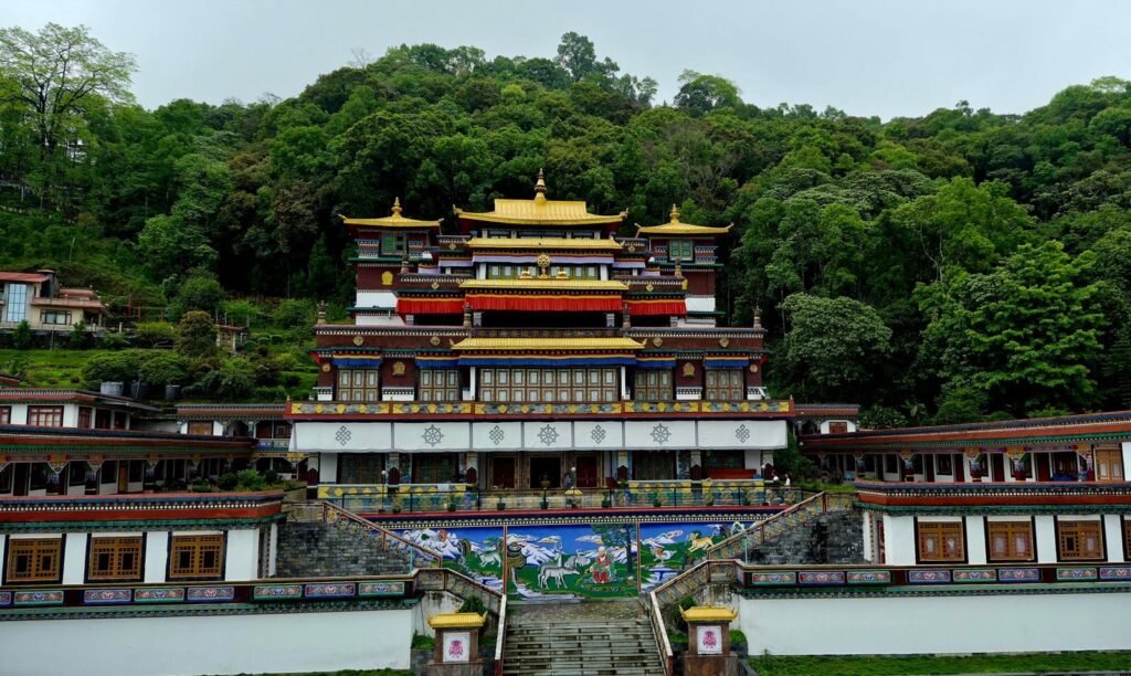 A stunning view of Lingdum Monastery set against lush greenery in Sikkim, India.