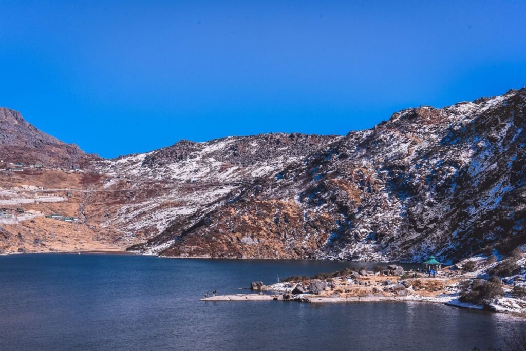 Scenic view of snow-covered mountains and lake in Gangtok, India. Perfect for nature lovers.